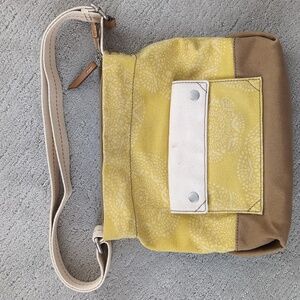 Fossil yellow and tan canvas purse